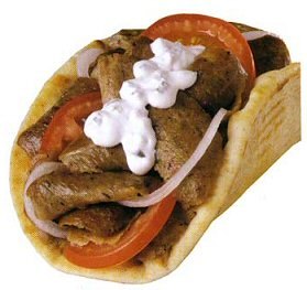 An American gyro in pita with sliced onions, tomatoes and tzatziki sauce